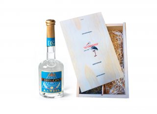 Premium gin in wooden box with tumbler